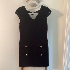Elegant Black Dress with Gold Accents